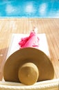 Beautiful woman relaxing near pool