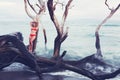 Beautiful Woman Relaxing by the Ocean