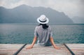 Beautiful woman relaxing on pier in Garda Lake Royalty Free Stock Photo