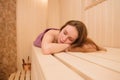 Beautiful woman relaxing in sauna and staying healthy Royalty Free Stock Photo