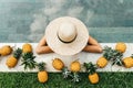 Beautiful Woman Relaxing In Swimming Pool With Pineapples. Royalty Free Stock Photo