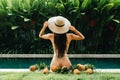 Beautiful Woman Relaxing In Swimming Pool With Pineapples. Healthy Lifestyle, Nutrition, Diet. Summer Vacation Royalty Free Stock Photo