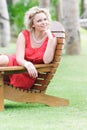 Beautiful woman resting on natural background