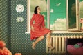 Beautiful woman in retro room Royalty Free Stock Photo