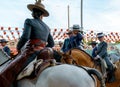 Beautiful woman rider on horseback dressed in traditional costumes at the April Fair