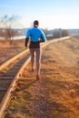 Beautiful woman runner jogging in nature