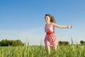 Beautiful woman runs on a glade Royalty Free Stock Photo