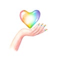 Beautiful woman`s hand with LGBT flag colors manicure nails and rainbow heart isolated on white background Royalty Free Stock Photo