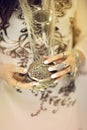 Beautiful woman`s hands holding vintage jewelry box, hand with perfect nail polish and silver rings Royalty Free Stock Photo
