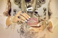 Beautiful woman`s hands holding vintage jewelry box, hand with perfect nail polish and silver rings Royalty Free Stock Photo