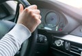 Beautiful Woman`s hands on a steering wheel of a modern car. Hands holding steering wheel. Woman driving modern car. Car interior Royalty Free Stock Photo