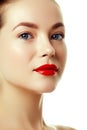 Beautiful woman`s purity face with bright red lip makeup Royalty Free Stock Photo