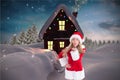 Beautiful woman in santa costume blowing a kiss Royalty Free Stock Photo