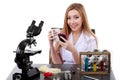 Beautiful woman scientist in laboratory with coffee speak phone Royalty Free Stock Photo