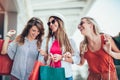 Woman with shopping bags in the city-sale, shopping, tourism and happy people concept Royalty Free Stock Photo