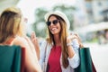 Woman with shopping bags in the city-sale, shopping, tourism and happy people concept Royalty Free Stock Photo