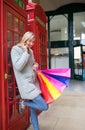 A beautiful woman with shopping bags in shopping street, London Royalty Free Stock Photo