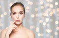 Beautiful woman showing her lips over lights Royalty Free Stock Photo