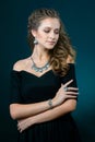 Beautiful woman showing off her jewelery in fashion concept wear Royalty Free Stock Photo