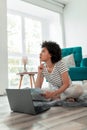 Woman calculating bank loan payout rates