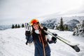 beautiful woman with ski and ski suit in winter Royalty Free Stock Photo