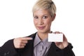 Beautiful woman smiles with a blank business card.