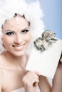 Beautiful woman smiling with fancy present Royalty Free Stock Photo