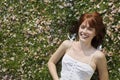 Beautiful Woman Smiling While Lying On Grass Royalty Free Stock Photo