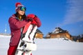 Beautiful woman with a snowboard. Sport concept