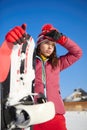 Beautiful woman with a snowboard. Sport concept