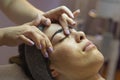 Beautiful woman in spa salon getting face treatment Royalty Free Stock Photo