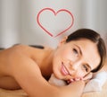 Beautiful woman in spa salon with hot stones Royalty Free Stock Photo