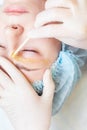 Beautiful woman in spa salon receiving epilation or correction eyebrow Royalty Free Stock Photo