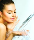 Beautiful woman with splashes of water Royalty Free Stock Photo