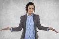 Beautiful woman spreads her hands, earphones on her ears Royalty Free Stock Photo