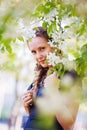 Beautiful woman in a spring garden Royalty Free Stock Photo