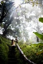 Beautiful Woman On Stairs On A Foggy And Wet Rainforest Path In Chiang Mai & X28;Thailand