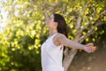 Beautiful woman standing with arms outstretched Royalty Free Stock Photo