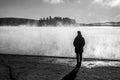 Beautiful woman standing lake of two rivers algonquin national park Canada look sunrise mist in the fog clouded swamp Royalty Free Stock Photo