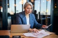 Charming female architect working on project in office Royalty Free Stock Photo