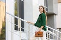 Beautiful woman with stylish leather bag outdoors on summer day Royalty Free Stock Photo