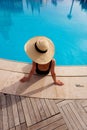 Beautiful woman sunbathing by the pool top view horizontal. Summer background. Poster, mock up for design