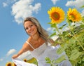 Beautiful woman on sunflower field Royalty Free Stock Photo