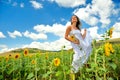 Beautiful woman on sunflower field Royalty Free Stock Photo