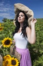 Beautiful woman in sunflower field Royalty Free Stock Photo
