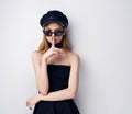 Beautiful woman sunglasses fashion jewelry black cap model Royalty Free Stock Photo