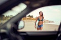 Beautiful woman surfer girl in bikini with surfboard on the beach Royalty Free Stock Photo