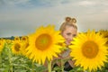 Beautiful woman surrounded by sunflowers Royalty Free Stock Photo