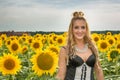 Beautiful woman surrounded by sunflowers Royalty Free Stock Photo