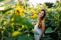 Beautiful woman surrounded by sunflowers Royalty Free Stock Photo